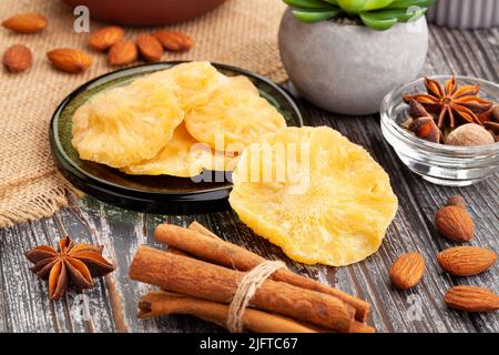 dry pineapple on wood background Stock Photo