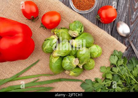 brussels sprouts on wood background top view Stock Photo