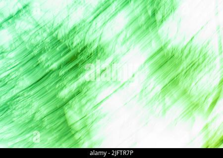 Pistachio color blur bokeh. Abstract green blurred gradient background with light. Stock Photo
