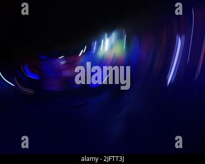 Modern futuristic vibrant night club blurred multicolored background. Stock Photo