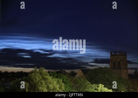 Noctilucent Clouds seen from Newcastle City Centre with Jesmond Parish Church a grade II listed building designed by the famous architect John Dobson in 1861, Newcastle upon Tyne, UK, 5th July, 2022, Credit: DEW/Alamy Live News Stock Photo