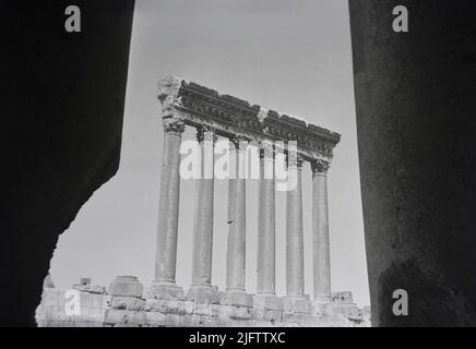 Ruins columns of the Temple of Jupiter Baalbek complex in Heliopolis Syriaca modern Lebanon vintage photo taken in the late 1940s B&W Stock Photo