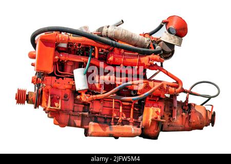 Old red diesel engine of a boat, isolated on white background. Stock Photo