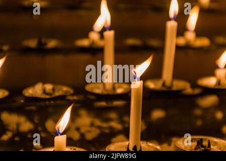 Votive candles. Liverpool Cathedral is the Cathedral of the Anglican Diocese of Liverpool, built on St James's Mount in Liverpool, and the seat of the Stock Photo