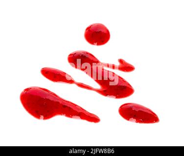 Strawberry jam drizzle isolated on white background. Splashes of berry confiture Stock Photo
