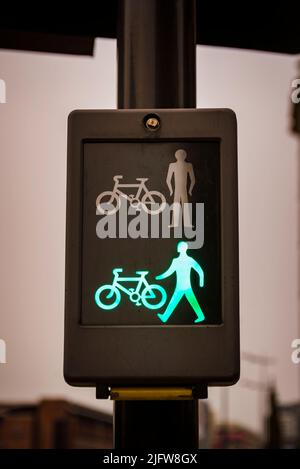 Green pedestrian traffic light. Liverpool, Merseyside, Lancashire, England, United Kingdom Stock Photo