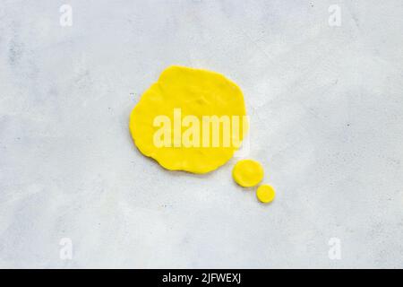Commenication and messengers concept with text speech bubbles made of plasticine. Stock Photo