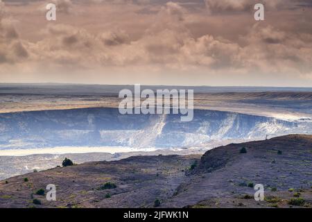 Large volcano in Mauna Loa. Landscape of smoky mountain on Big Island, Hawaii. A dormant volcano in open secluded area. Overcast sky with steaming Stock Photo