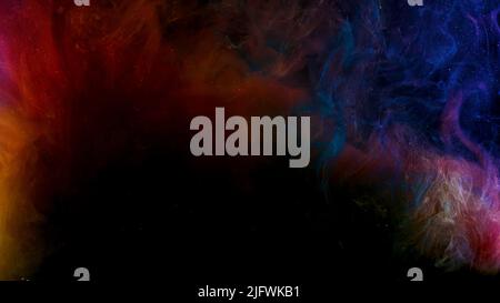 Bright flying multicolored smoke.Footage.Multi-colored animation that scatters all over the background, but very slowly. High quality 4k footage Stock Photo