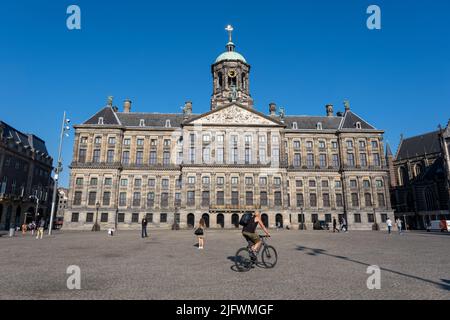 Amsterdam, The Netherlands - 23 June 2022: The Royal Palace of Amsterdam on Dam Square Stock Photo