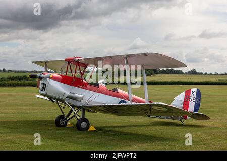 1931 DH82a Tiger Moth “K2585”  on static display at the Fly Navy Airshow held at Shuttleworth, Old Warden on the 3rd July 2022 Stock Photo