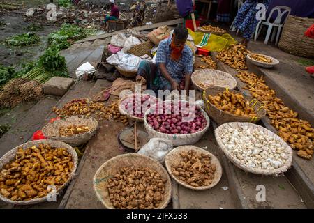 A spices seller on the bank of Buriganga River in Old Dhaka, Bangladesh Stock Photo