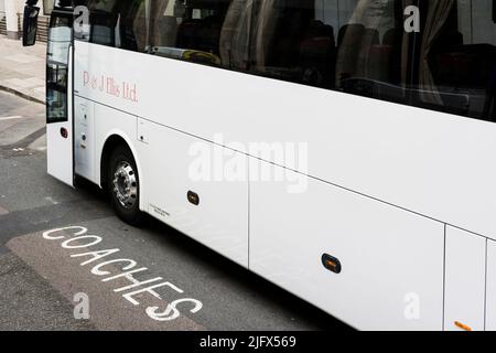 A coach parked in central London. City of Westminster, London, England, UK, Europe Stock Photo