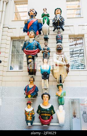 Collection of figureheads. The National Maritime Museum, NMM, is a maritime museum in Greenwich, London. It is part of Royal Museums Greenwich, a netw Stock Photo