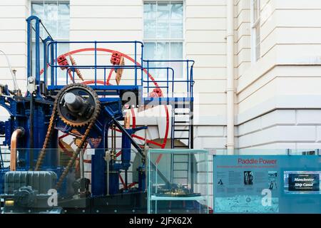 Port engine and paddle wheel of the tug Reliant. The National Maritime Museum, NMM, is a maritime museum in Greenwich, London. It is part of Royal Mus Stock Photo