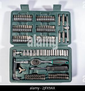 A complete small ratchet toolbox isolated on white background Stock Photo