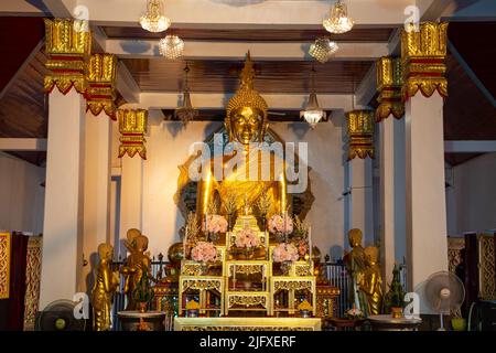 Luang Phua Phra Ong Saen is a place of worship for the villagers who are enshrined in the Viharn of Wat Phra That Choeng Chum Worawihan. In Thailand. Stock Photo