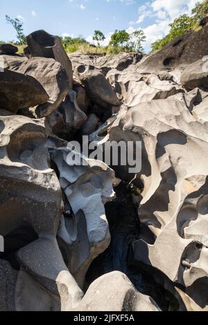 Beautiful view to rocky scenario with river cutting through stones Stock Photo