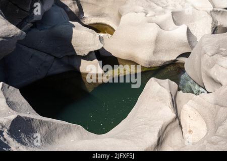 Beautiful view to rocky scenario with river cutting through stones Stock Photo