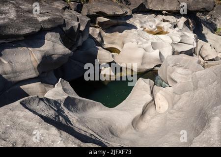 Beautiful view to rocky scenario with river cutting through stones Stock Photo