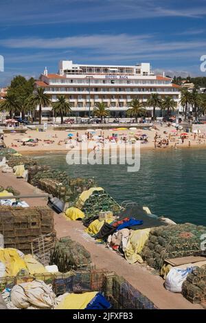 Commercial fishing pier and beach at Cascais, Portugal. Stock Photo