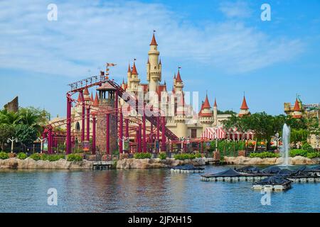 Scenery view of the beautiful fairytale castle with the roller coaster in Far Far Away zone in Universal Studios Singapore, a theme amusement park Stock Photo