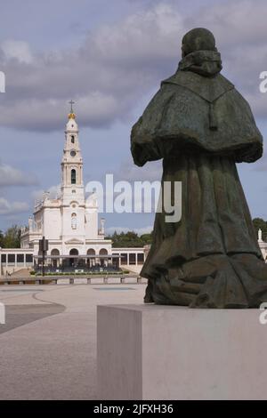 Statue of Pope Paul XI and Fatima basilica, Fatima, Portugal. Stock Photo
