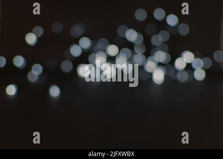 Background image with black and white bokeh lights. Stock Photo