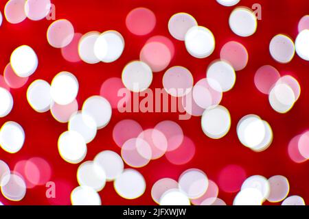 Background image with red and white bokeh lights. Stock Photo