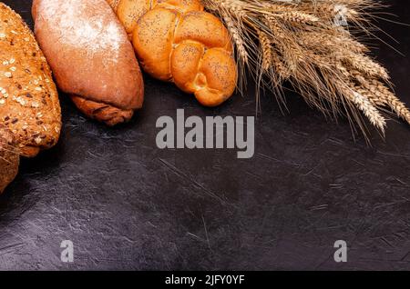 The range of different types of bread from rye and wheat flour. Stock Photo