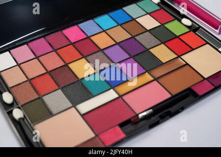 Professional Makeup Kit close up Shot, Makeup palette with various brush  Makeup Artist Stock Photo