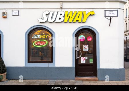 BUDAPEST - JAN 18: Entrance to the Subway cafe with signboard in Budapest, January 18. 2022 in Hungary. Subway is an American fast food restaurant fra Stock Photo