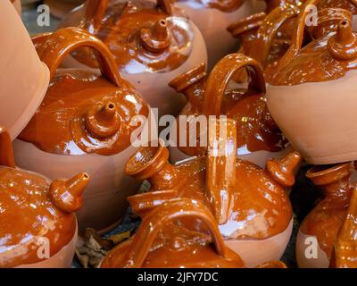 Pottery vases on shelf. Artisan handmade products Stock Photo