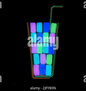 Neon-glow effect club party cocktail shake flat-lay made from fruit jelly candies and drinking straws isolated on black background. Stock Photo