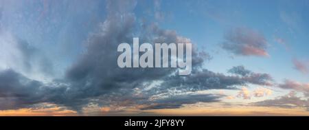 Fantastic soft thunderclouds at sunrise, natural composition Stock Photo