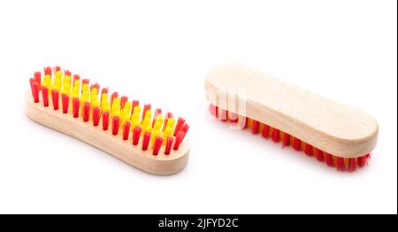 New wooden brush for cleaning clothes isolated on white background Stock Photo