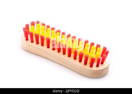 New wooden brush for cleaning clothes isolated on white background Stock Photo