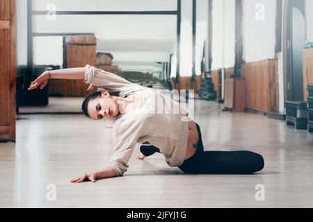 young woman girl dancing contemporary dance Stock Photo