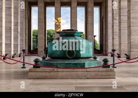 ROSARIO, ARGENTINA - MARCH 12, 2021: Eternal flame in the Triumphal Propylaea of the Homeland. National Flag Monument located at Rosario city, Argen Stock Photo