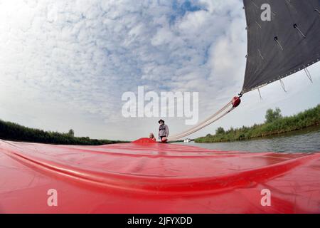 sailing on board the norfolk wherry Albion Ludham norfolk england Stock Photo