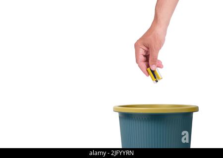 Throwing old used batteries in trash, on white background Stock Photo