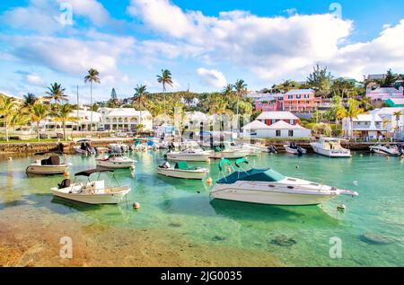 Boats moored in the clear turquoise waters of Flatt's Inlet, Hamilton Parish, Bermuda, Atlantic, Central America Stock Photo