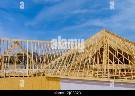 Aerial view of a newly built stick-built home with a timber frame beam framework Stock Photo