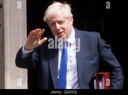 London, UK. 6th July, 2022. UK Prime Minister, Boris Johnson, leaves 10 Downing Street. He will face a grilling from Keir Starmer about recent Cabinet resignations. Boris Johnson leaves for PMQs. Downing Street. Credit: Karl Black/Alamy Live News Stock Photo