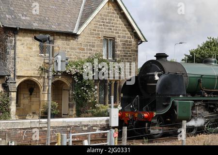 Steam Train (SR S15 class locomotive) entering Ruswarp station,  North Yorkshire, UK Stock Photo