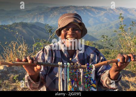 Local seller of bead bracelets Stock Photo