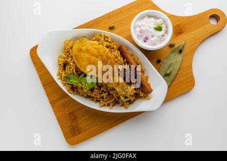 Chicken biryani Spicy Indian Malabar biryani Hyderabadi biryani pulao with egg. Shot of Kerala India Sri Lanka style biriyani made of basmati rice Stock Photo