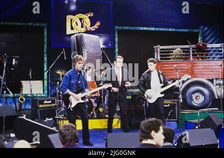 British rock band Dr Feelgood performing live on the DOC music show for Rai television in Rome 1988 Stock Photo