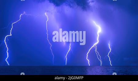 Night Lightning storm over the Gulf of Mexico in Venice Florida USA Stock Photo