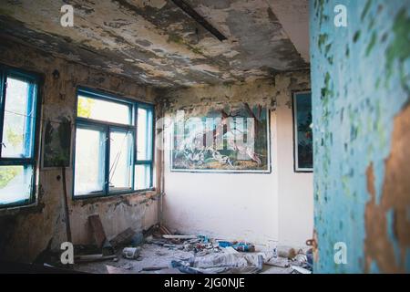 Abandoned ruined industrial building room inside interior, dark dirty grunge and creepy atmosphere Stock Photo